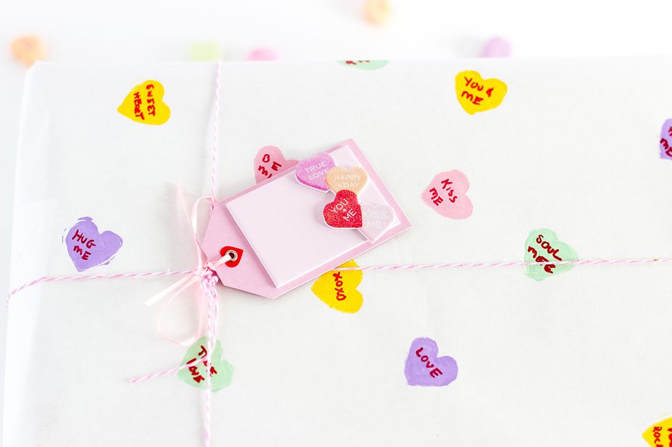 Using a red marker, write cute messages inside the hearts.