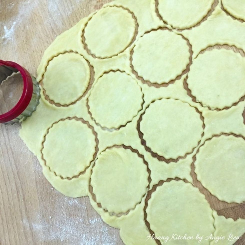 Using a round cookie cutter that's slightly bigger than the muffin cups, cut pastry into 24 rounds. You can use a plain or fluted cookie cutter. Cut as close as possible so you don't waste any pastry.