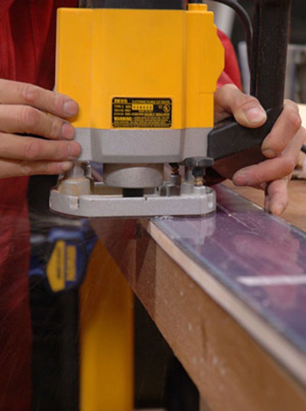 Using a router, go around the whole ski to shape the sidewalls to a preferred angle