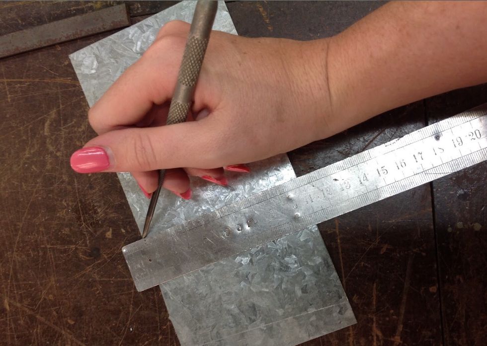 Using a ruler and scribe Measure your sheet metal using the measurements 7cm x 7cm