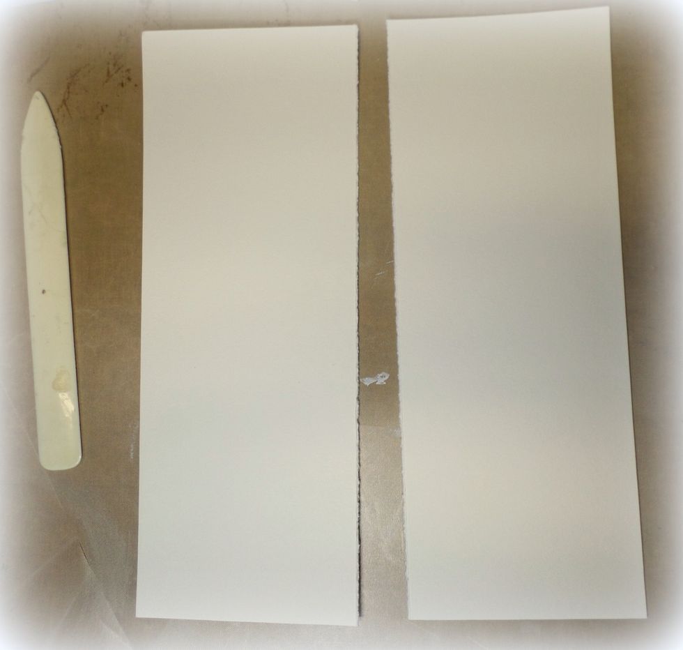 Using a scoring board or paper trimmer, score the 12"x9" Mixed Media Paper in half. You will have 2~ 4.5"x12" sides. Do this to 2 pieces of Mixed Media paper.