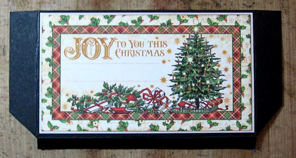 Using a scoring tool, score 1/8" from both sides and the bottom of the image. Crease with a bone folder. Bevel the edges to form a pocket.