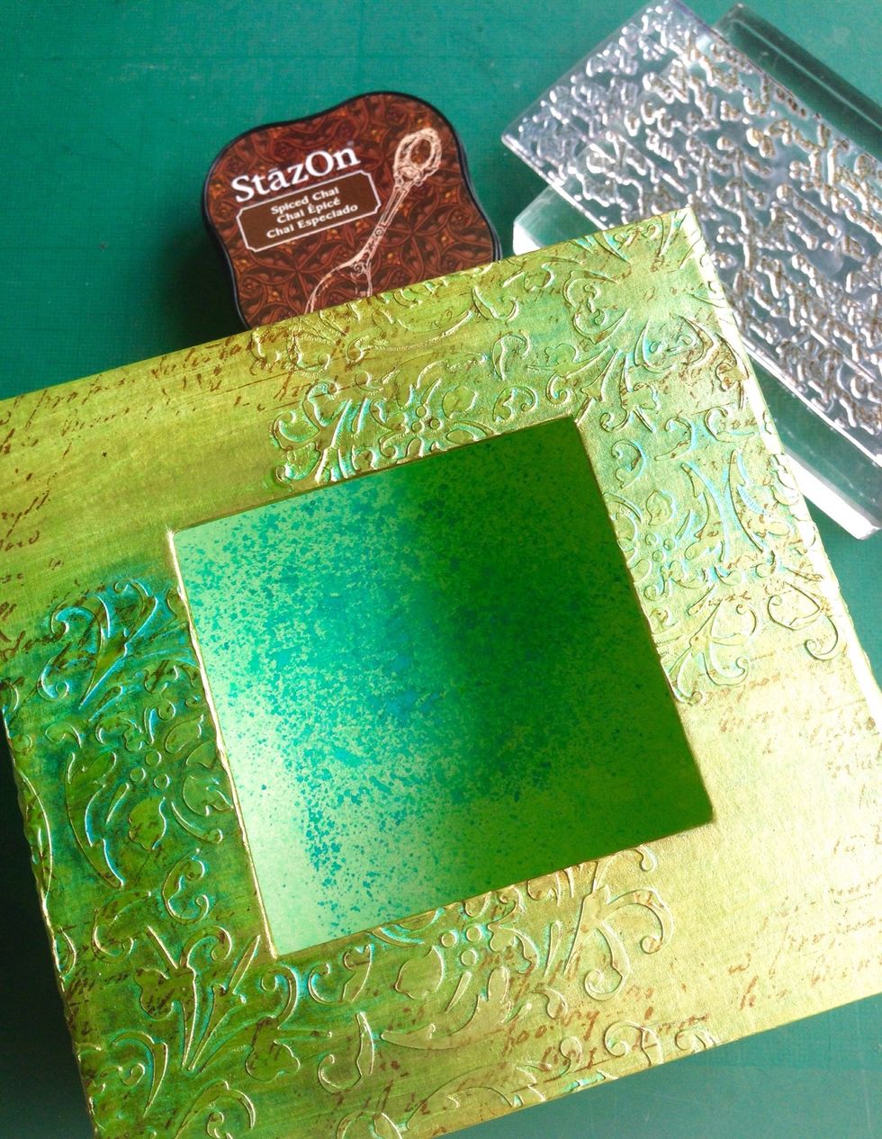Using a script stamp, stamp onto the surfaces randomly with StazOn...