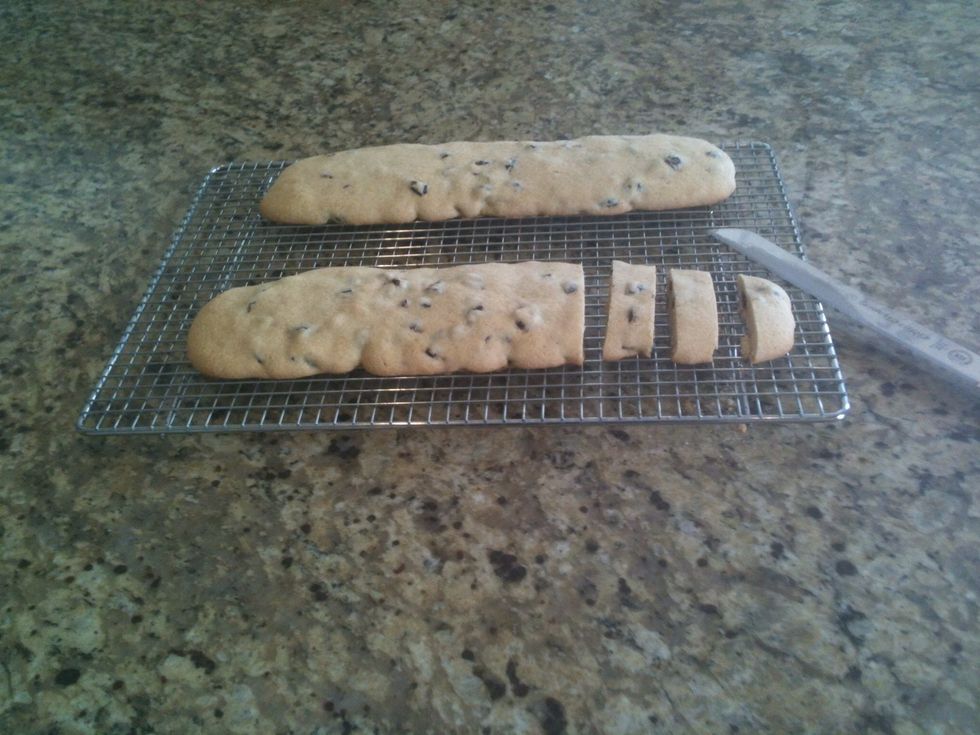 Using a sharp serrated knife, cut cookies into 3/4 inch thick slices.
