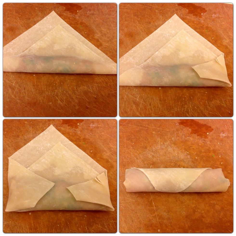 Using a simple four step process roll the Salmon egg roll up starting with the bottom point and bringing it to the top. Then fold both corners in, damp the top point and finish rolling tightly.