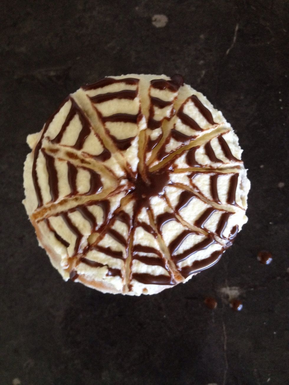 Using a skewer, draw lines from the middle of the swirl outwards to create a coffee pattern.