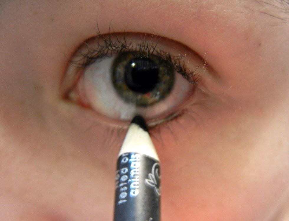 Using a slightly sharpened pencil, line your bottom lid by following your lash line with smooth, back-and-forth motions. Pull down gently on your bottom lid if it helps.
