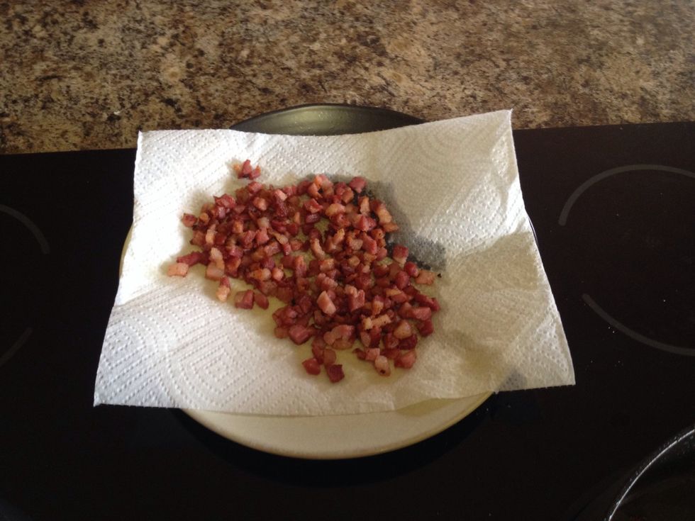 Using a slotted spoon, remove cooked pancetta from pan, leaving behind the yummy juices.
