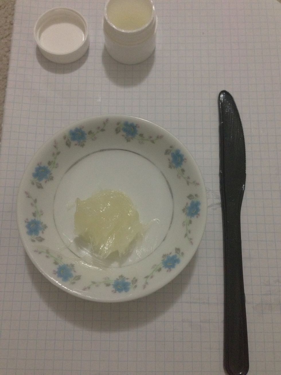 Using a small spoon or knife add Vaseline to plate. Mix it around a bit to make it pliable.