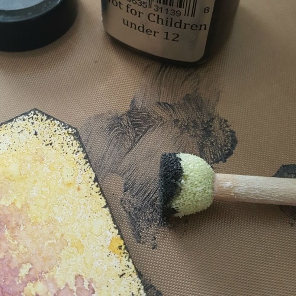 using a sponge dauber, apply Sorbet medium - Black Leather Jacket around edges of the tags