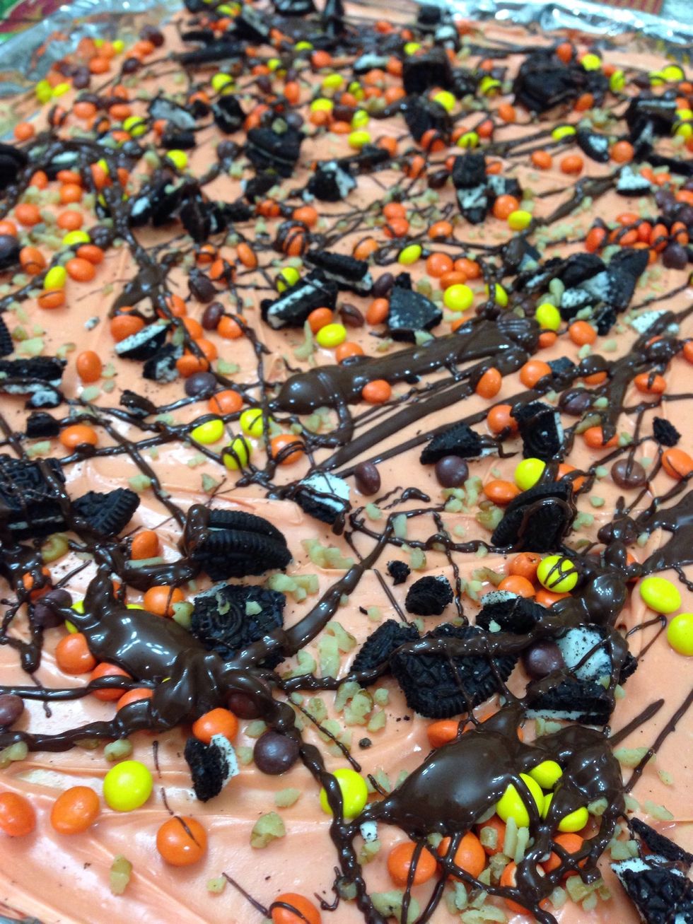 Using a spoon drizzle the chocolate all over the bark. Yum! Chill it in the fridge for about 20 minutes or until the chocolate it set.