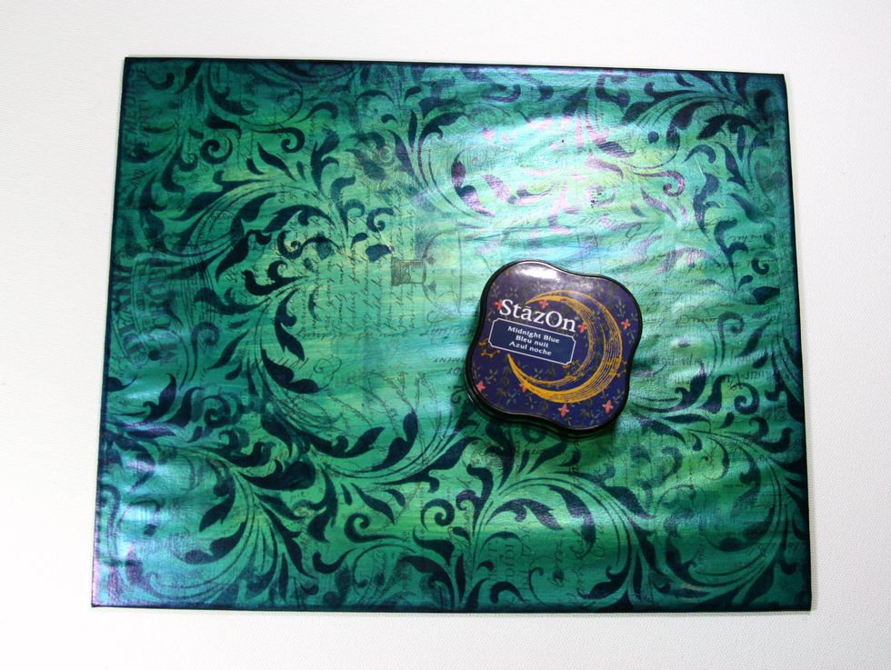 Using a stencil add pattern to prepared chipboard panel with Midnight Blue StazOn. Allow to dry.