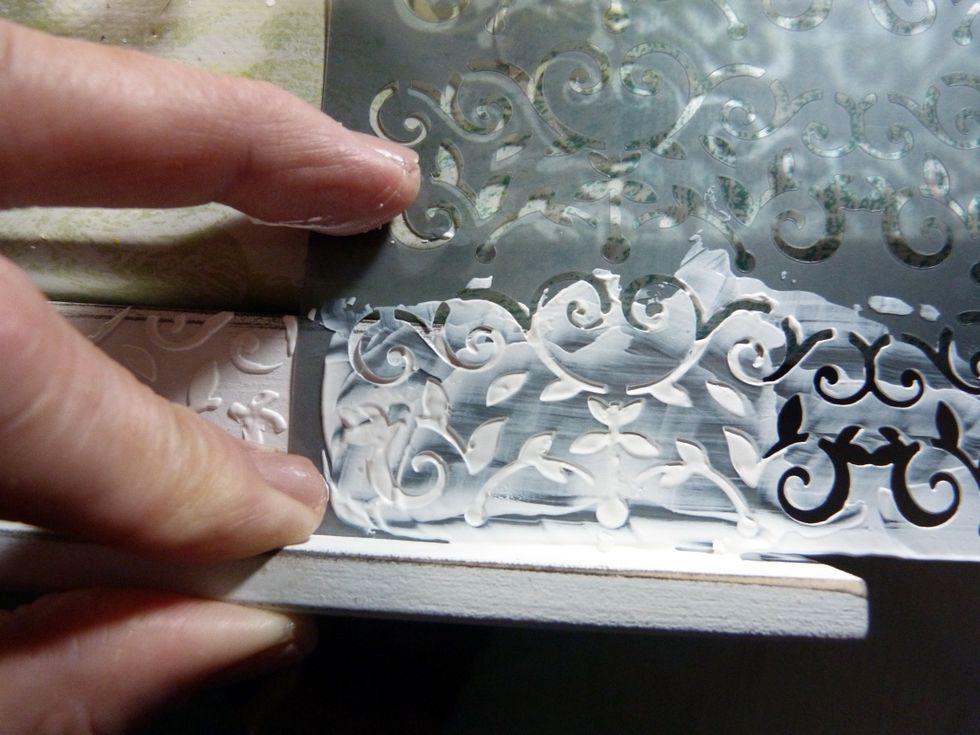 Using a stencil of choice, add Crackle texture Paste all around the outside edge of the shadow box. This is a little tricky but take your time.