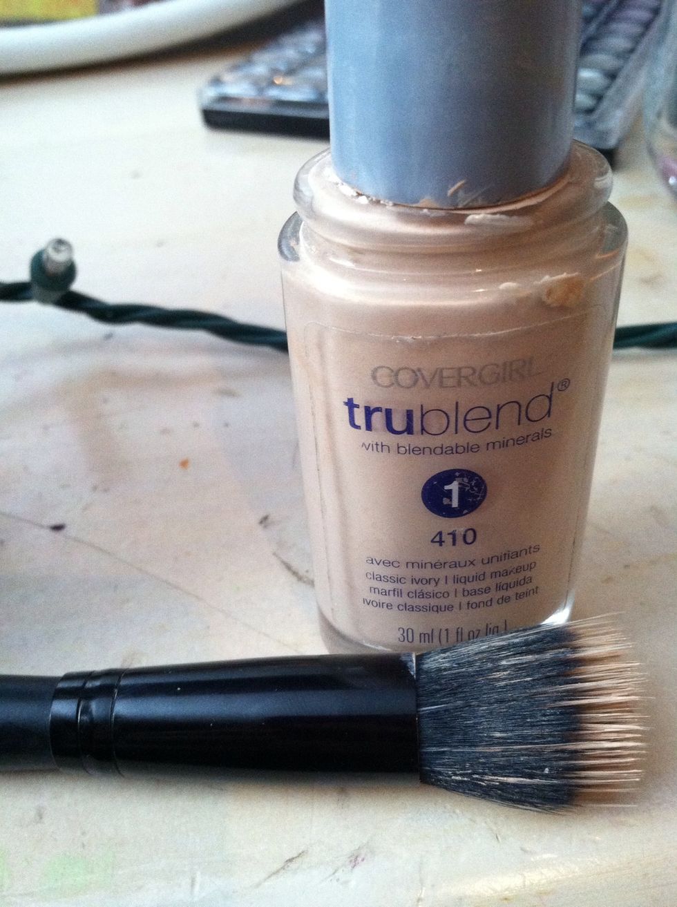Using a stippling brush and liquid foundation, apply a thin layer across your whole face