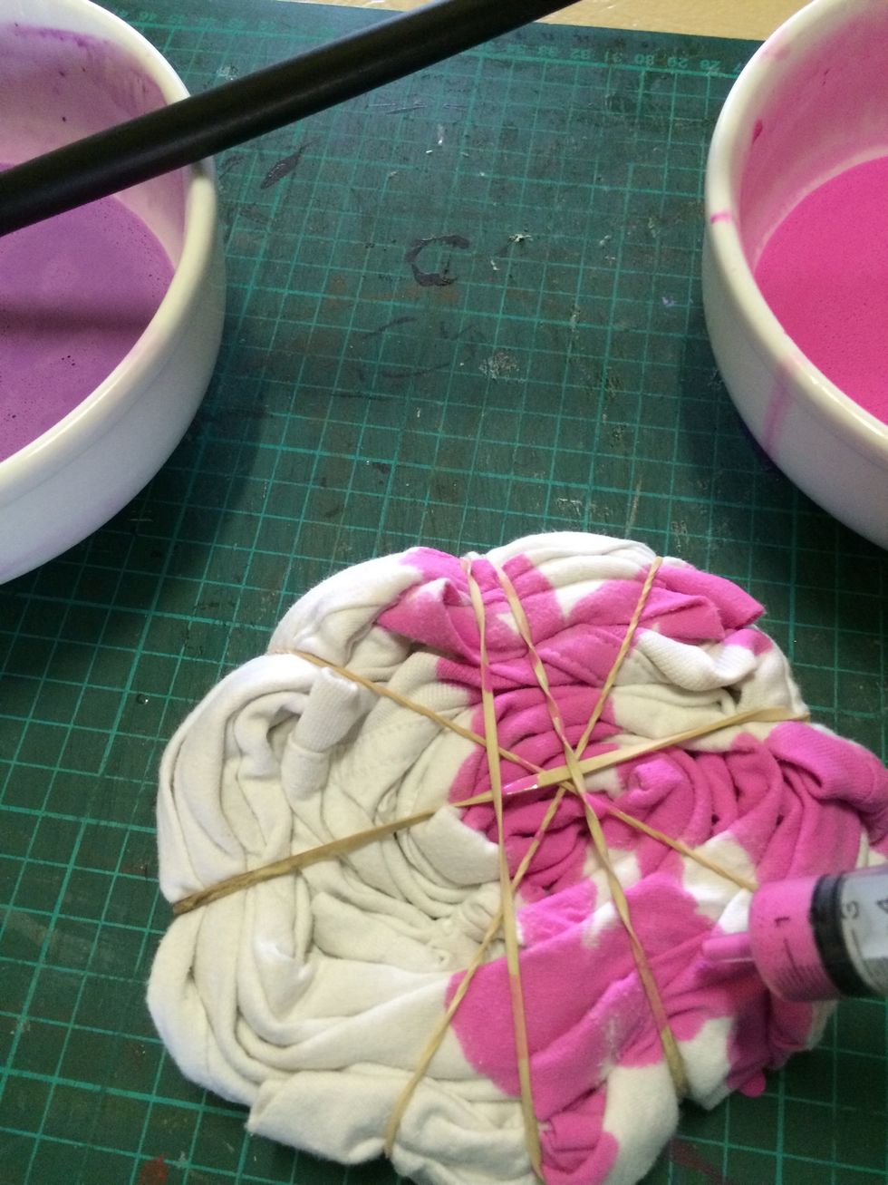 Using a syringe if you have one add the paint in whatever patterns you wish to try. You could use a spoon or similar to spoon on the paint if you don't have a syringe.