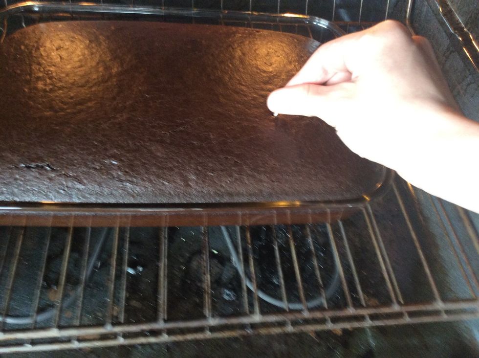 Using a toothpick determine if the cake is done. Stick the toothpick into the cake and make sure it reaches the bottom of the pan. It's done If it pulls out easy with no batter on the sides.