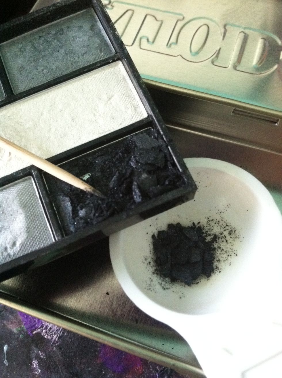 Using a toothpick, scrape out 1tsp. of the eyeshadow you want the eyeliner to be the color of.