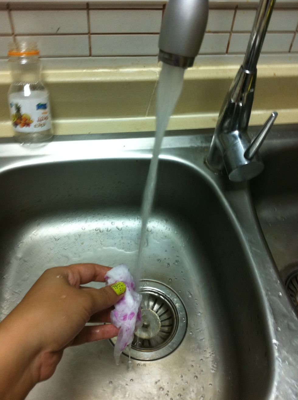 Using a very wet tissue...