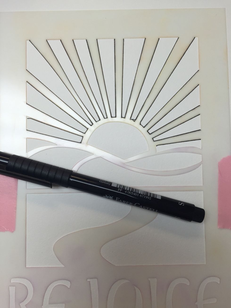 Using a waterproof pen draw your selected part of the stencil. I'm using the rays