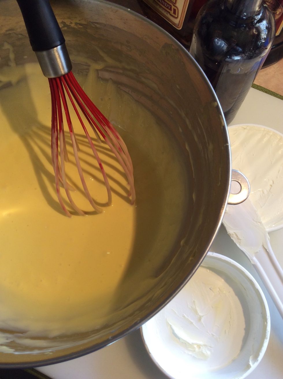 Using a whisk or spatula, blend in the mascarpone until no lumps are visible.