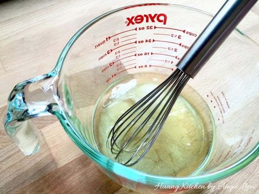 Using a wire whisk, mix to dissolve sugar and salt in the egg whites.