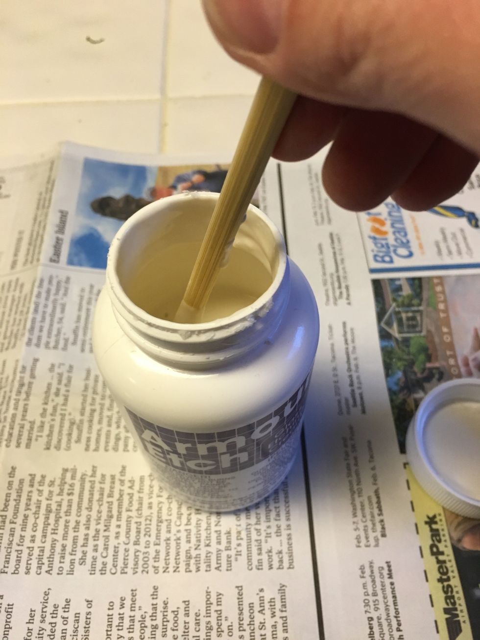 Using a wooden craft stick or chopstick, stir the etching cream well.