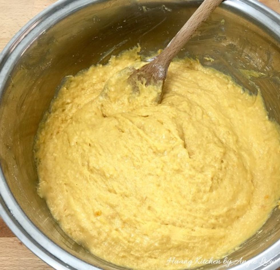 Using a wooden spoon, gently fold the sifted DRY flour mixture into the WET pumpkin mixture until JUST blended and there is no traces of flour.