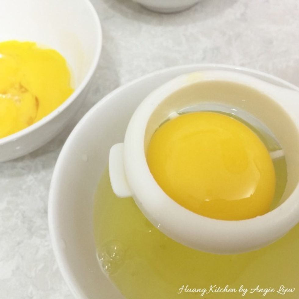 Using an egg separator, separate the egg yolks from the egg whites. Retain egg whites and keep the yolks for other use.