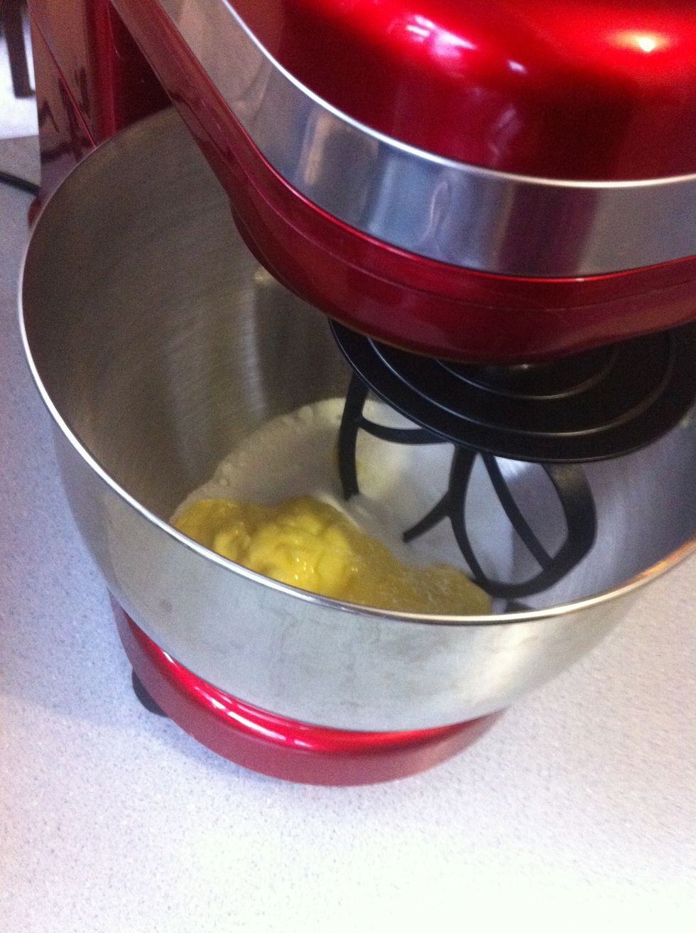 Using an electric mixer, beat butter and sugar in a large bowl until light and creamy.