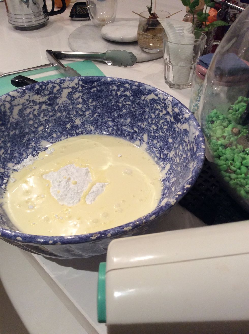 Using an electric mixer, beat sifted icing sugar with cream on medium-high speed until soft peaks form.