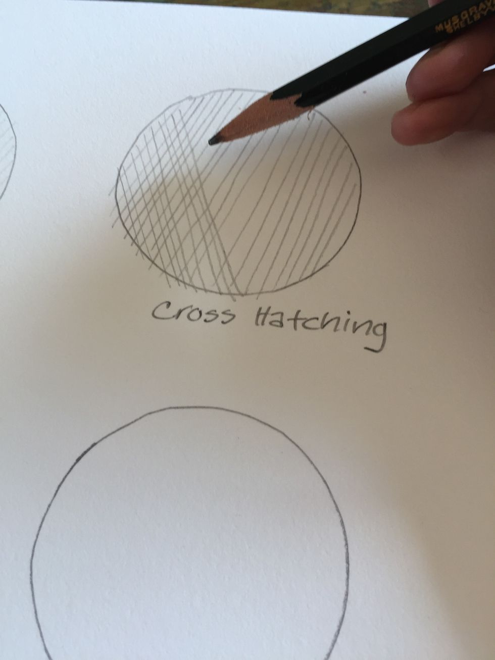 Using an H pencil Begin with hatching lines and then overlap with lines in the other direction. Cross hatching creates a darker shaded area