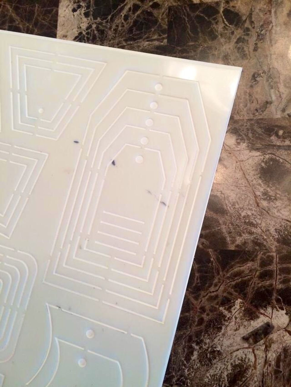 Using an old tag template, cut your tag from watercolor paper. I use cold press because I like the extra texture.