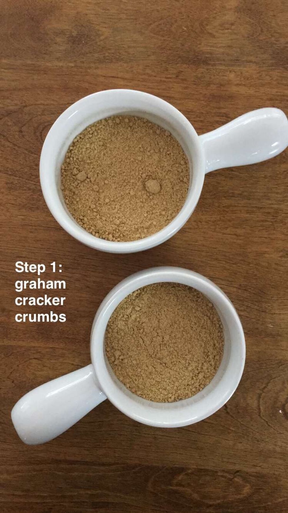 Using an oven safe bowl, pour in the crushed graham crackers until the bottom is covered evenly. (Gluten free folks: just use gluten free s'mooreables crackers!)