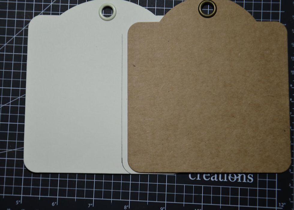 Using another tag place along the line drawn and trace around the rounded corner of the tag as shown.