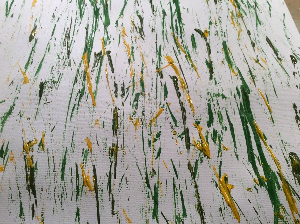 Using different shades of green with a bit of mustard, I dipped my pine tree needles in the paint and swipped it across my paper. I love the randomness... just what I wanted to mimic grass.