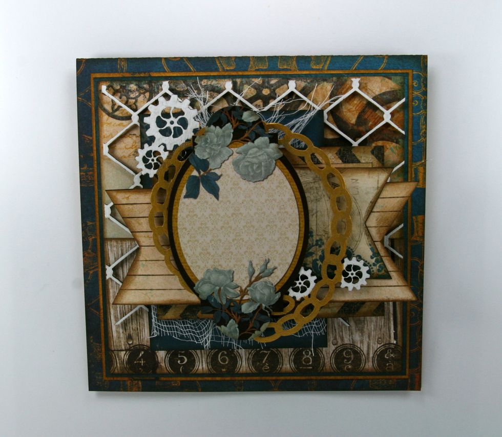 Using foam spacers attach the oval floral sticker.