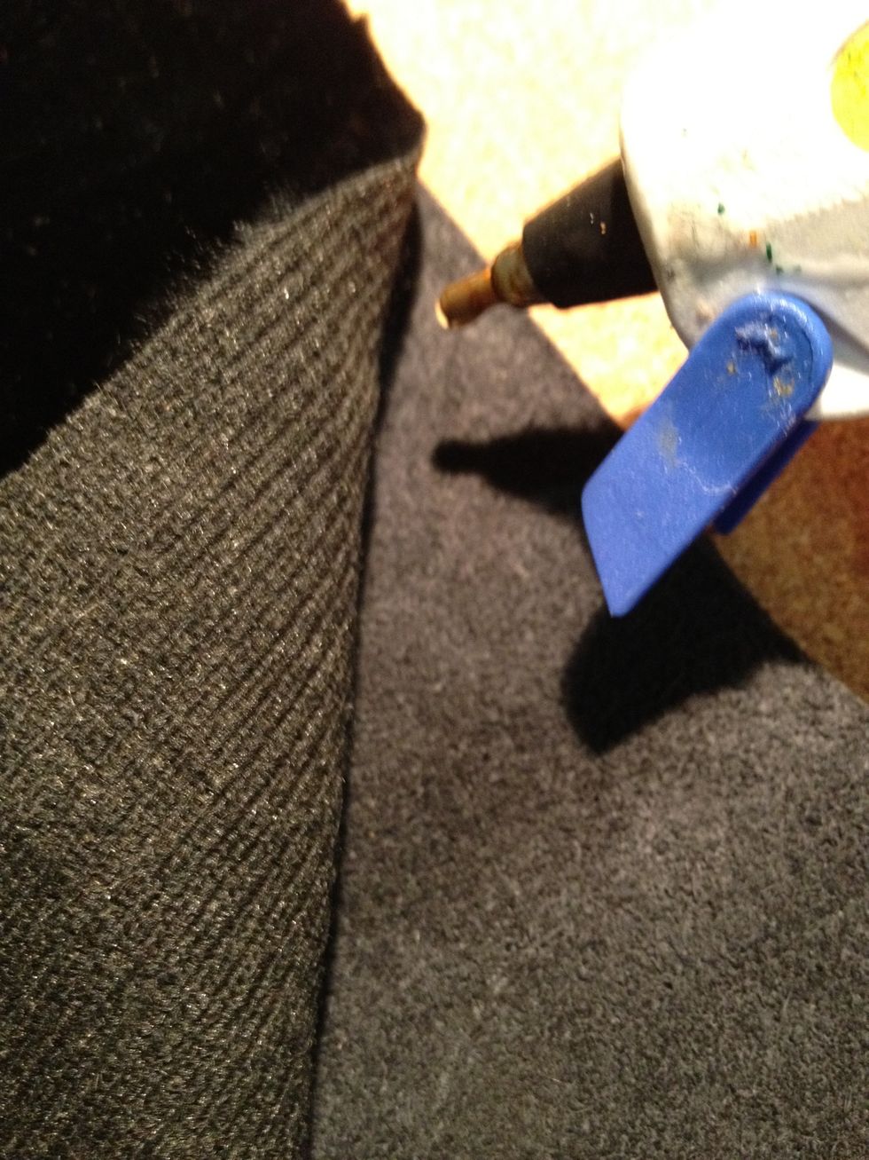 Using glue gun, glue the fabric to the leather. Make sure not to get any glue on the visible part of the leather, it won't look too nice otherwise \ud83d\ude0a.