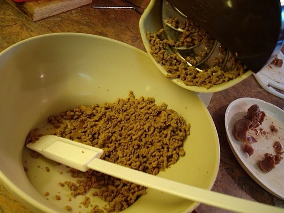 Using grinder, grind up giblets. This is truly what makes this stuffing so good! (Yes, and I'm a person who would never eat liver, and certainly never a heart!)