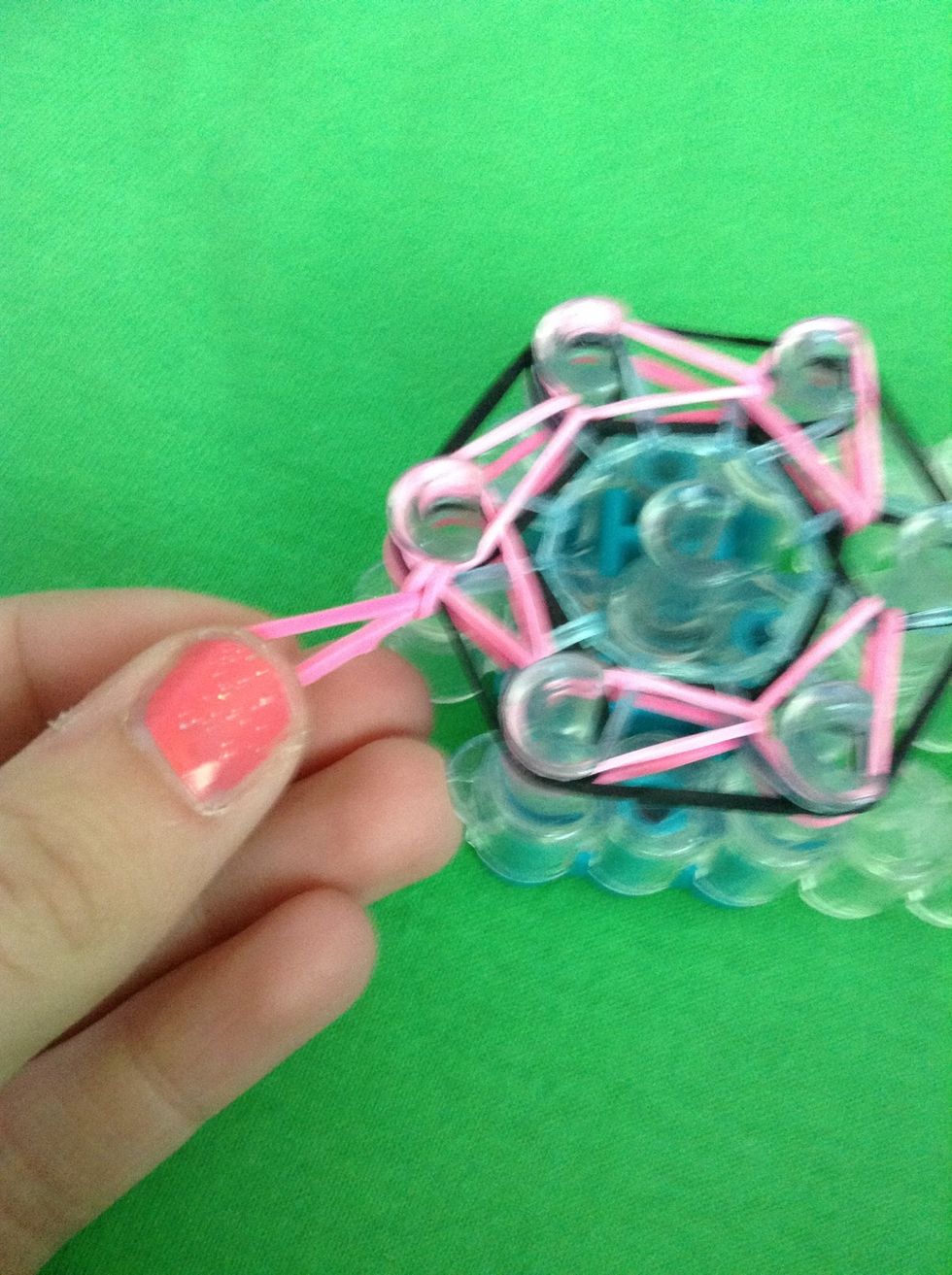 Using he 20th rubber band pull the charm off the loom carefully!