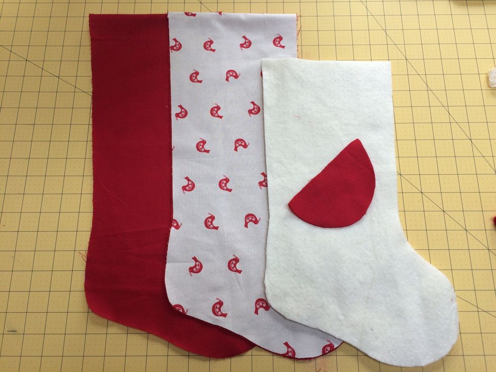 Using joined template cut 2 batting. Add 3.5 inches to length and cut 2 each of main and lining fabric . Use toe pattern and trace onto bondaweb. Iron bondaweb to lining fabric and cut out 2 toes