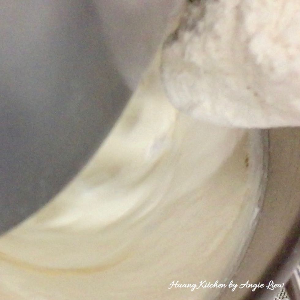 Using low speed, gradually whisk in sifted all-purpose flour.