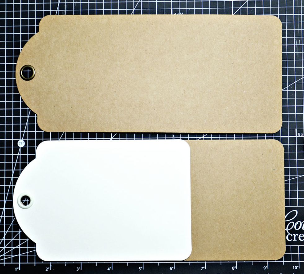 Using medium size Graphic 45 tag trace around bottom edge to give a line to cut around.