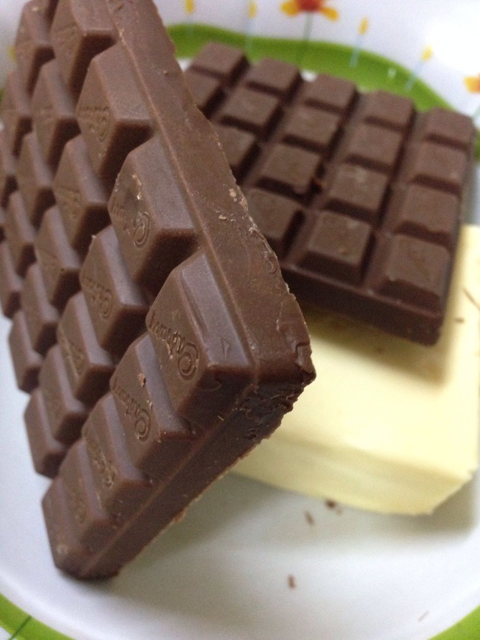 Using microwave, melt 200g of butter and 175g of chocolate bar