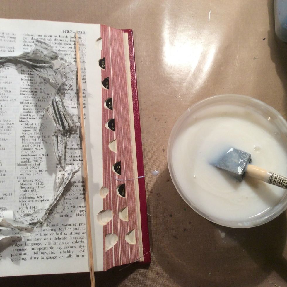 Using Mod Podge or you can make it yourself... 1/2 water and 1/2 regular school glue...mix together well.