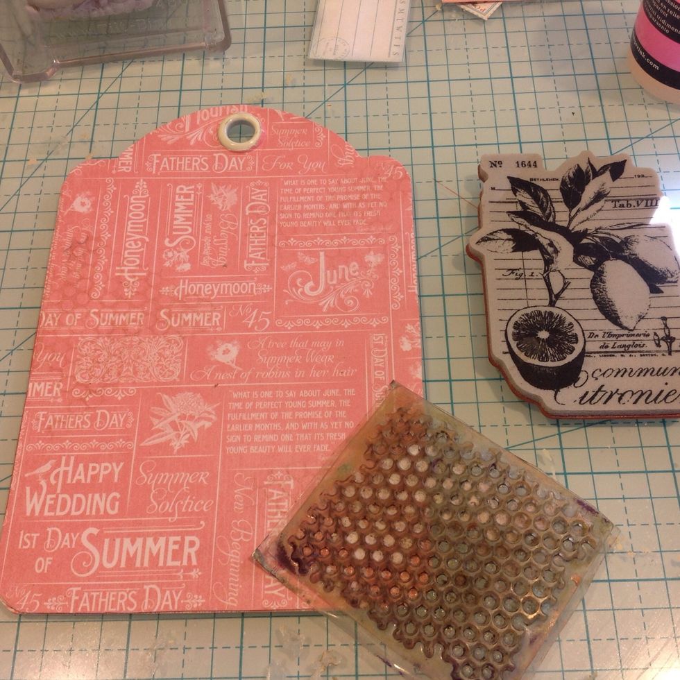 Using more stamps from my stash and different chalkedgers I randomly stamped my background.