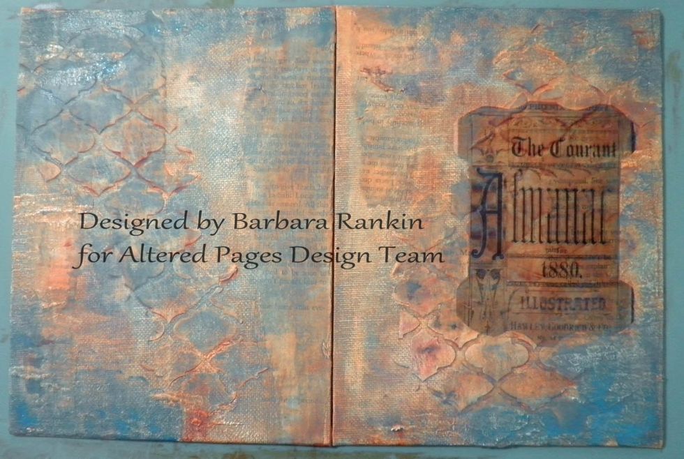 Using my finger for best control, I applied the DecoArt Patina Green Antiquing Cream to the covers, concentrating on the crackles and outer edges. You can use a baby wipe to remove some to the cream.