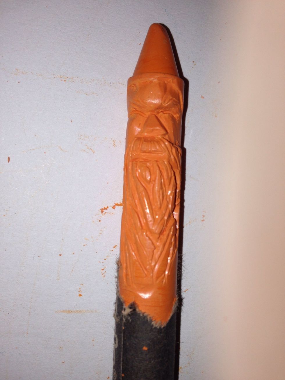 Using needle tool carve small hairs and details