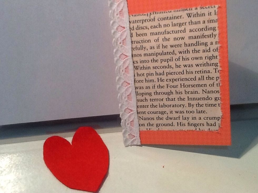 Using red felt, cut out a heart shape that fits the front.