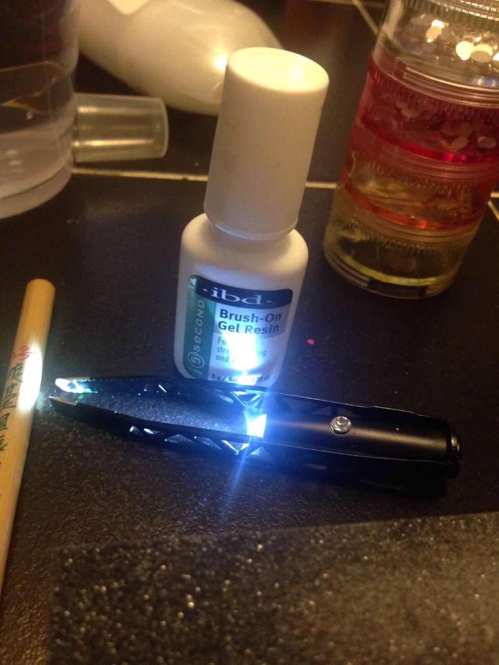 Using resin and tweezers found at Sally's beauty supply I'll add my Swarovski crystal's