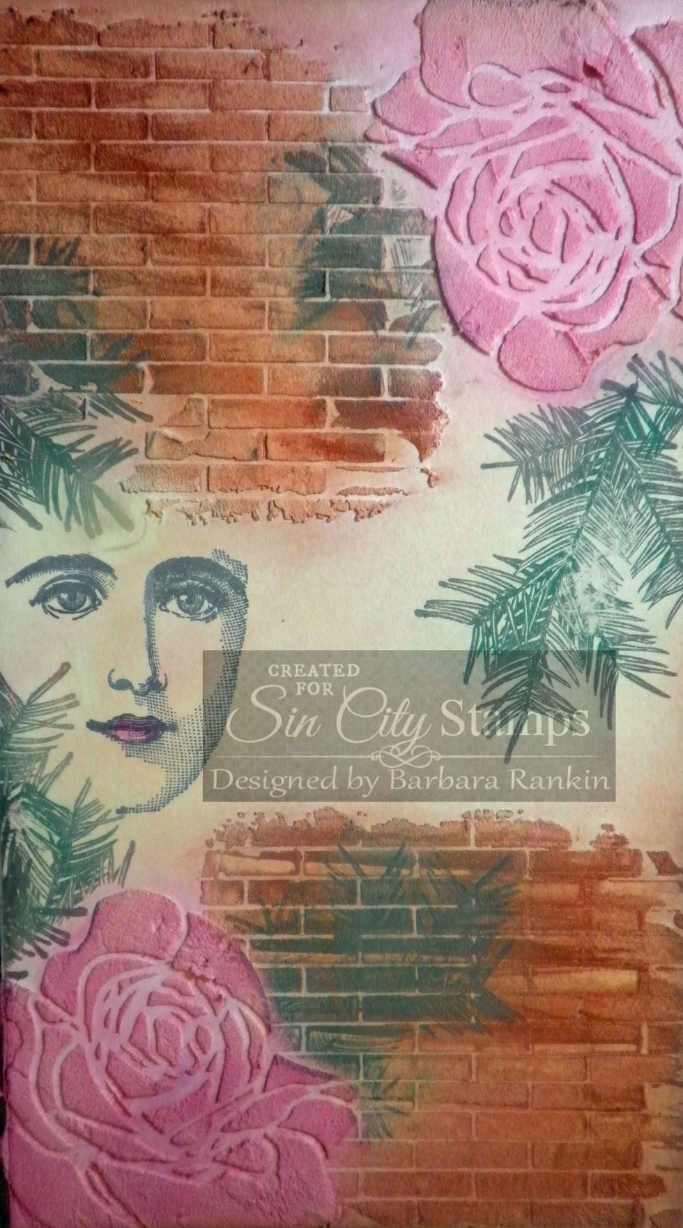 Using Softt sponge, lightly apply Permanent Green over the stamped pine bough images. The Versamark ink will grab the Pan Pastels.